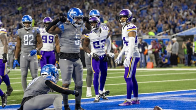 Detroit Lions running back David Montgomery celebrates a touchdown against the Minnesota Vikings.